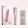 Leah Lighted Dermaplaner Facial Hair Removal + Exfoliating Tool from Fancii & Co. shown with replacement blades in Pink 