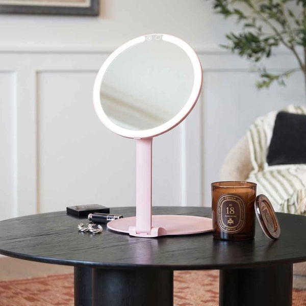 Fancii Abigail Travel Mirror with LED Lights Hero Extended and Folded Down In Use, Folds Out Anywhere

Pink None