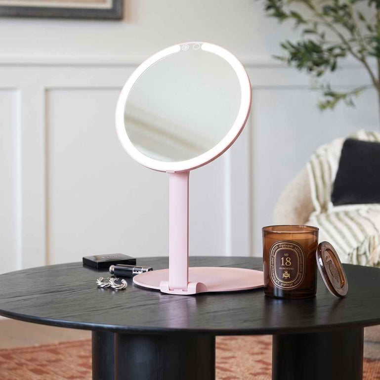 Fancii Abigail Travel Mirror with LED Lights Hero Extended and Folded Down In Use, Folds Out Anywhere

Pink None