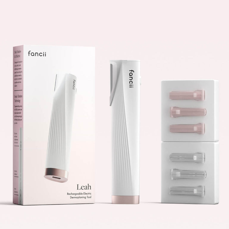 Leah Replacement Blade Package by Fancii & Co. in White placed beside the Leah Dermaplaner