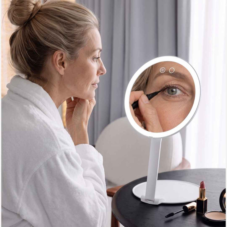 Abigail Foldable Lighted Travel Vanity by Fancii & Co. Lit Up and Being Used to Do Makeup