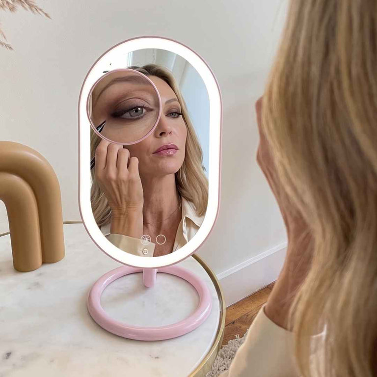 Taylor Lighted Compact by Fancii & Co. Open and being used to check teeth at resteraunt